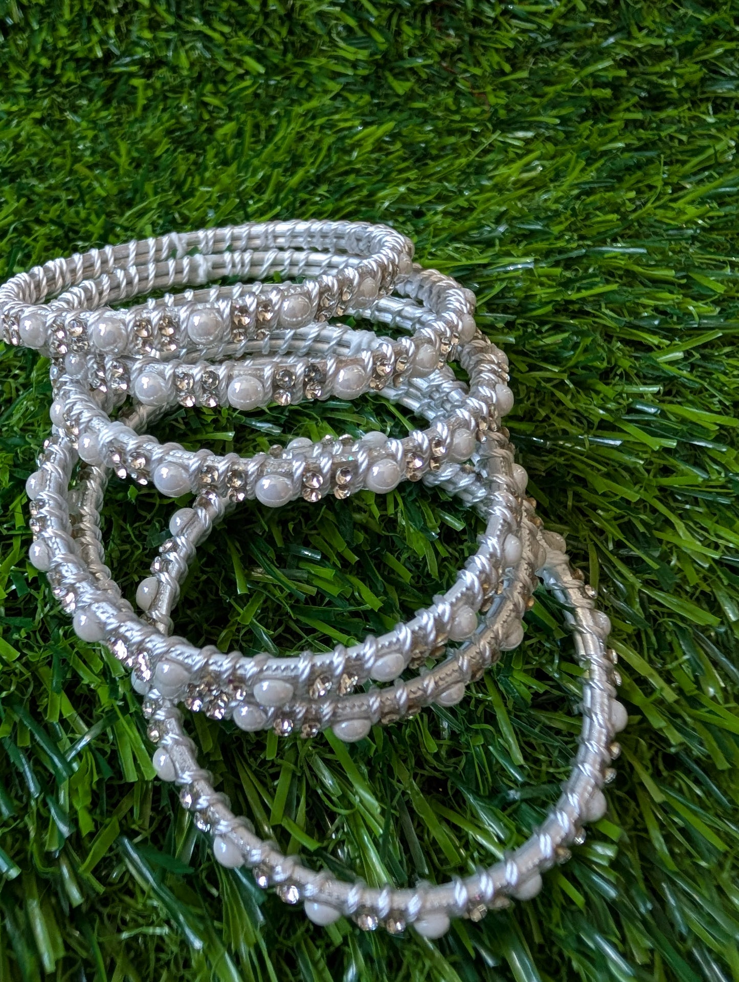 Silver thread and white pearls bangles