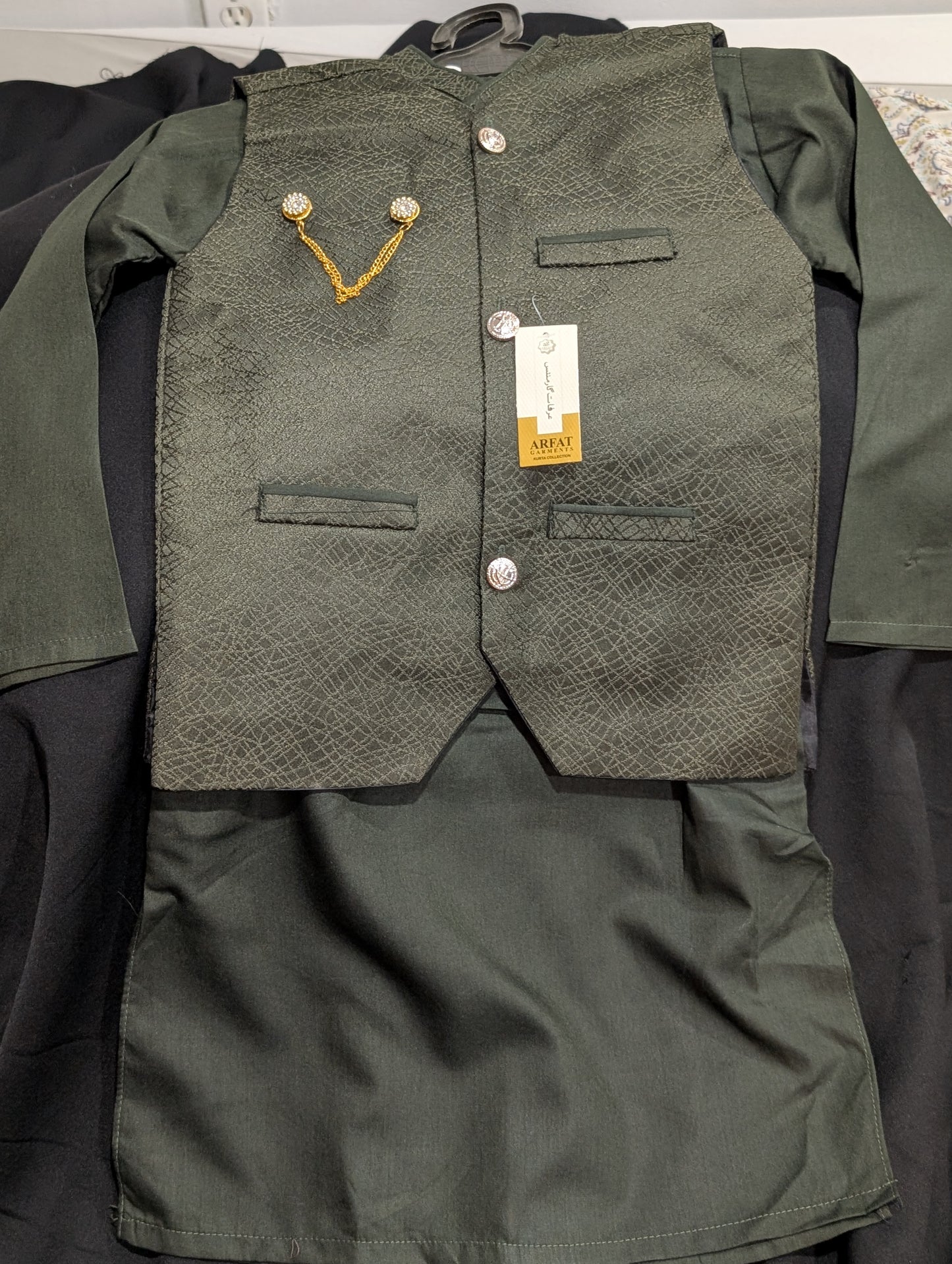 Boys' olive green kurta pyjamas with a matching pattern waistcoat