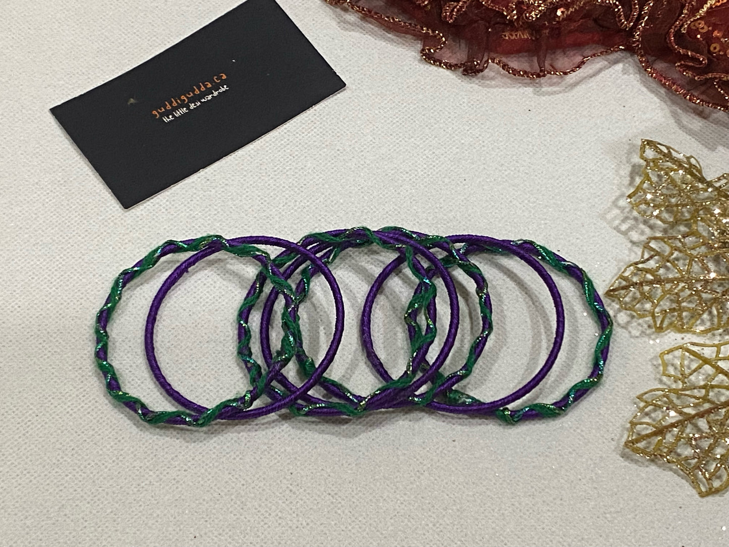 Girls purple and green bangles