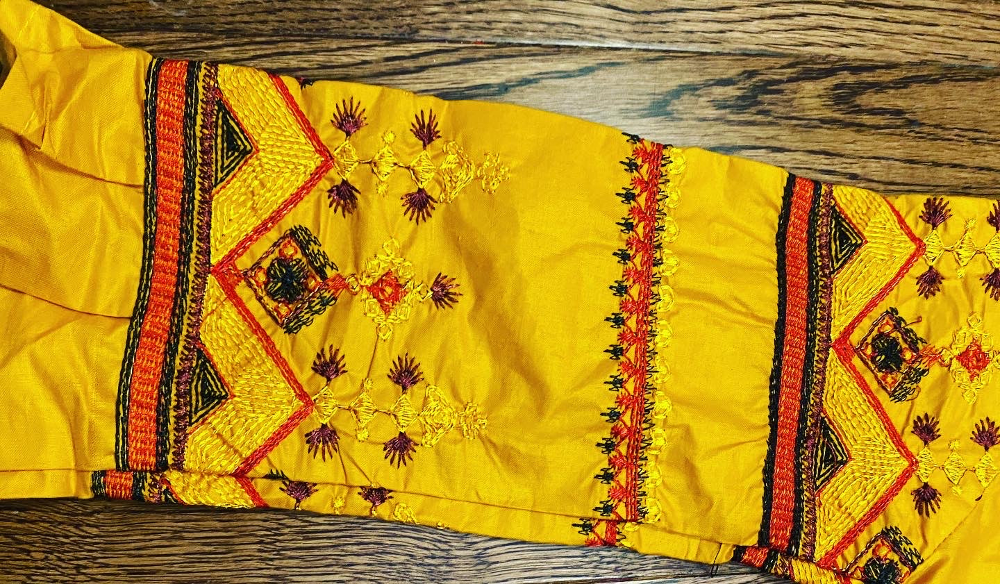 Yellow embroidered shirt with mix and match red trouser