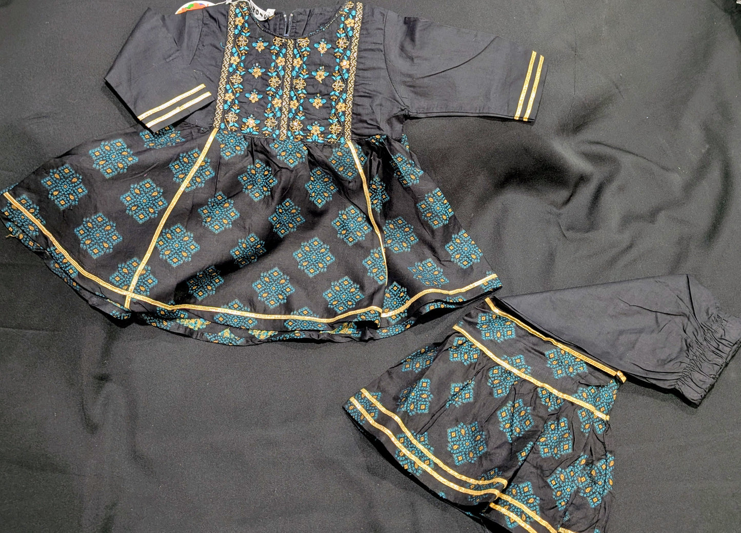 Girls' cotton self-printed embroidered and gotta work frocks and gharara sets (available in two colors).
