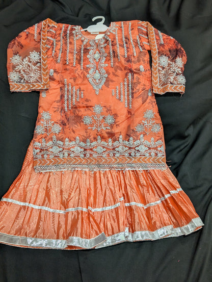 Girls' chiffon shirts featuring embroidery, self-print, and stylish sleeves, paired with a crushed gharara and net dupatta.