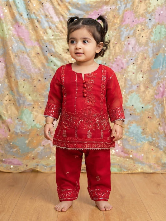 Girls Vibrant red  traditional kurta and pants set featuring intricate tonal embroidery, sequin work, and sheer sleeves.