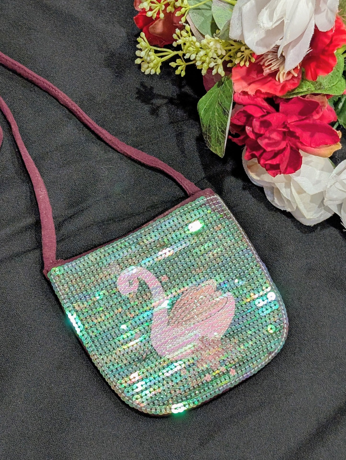 Shimmery bags with swan motifs for girls