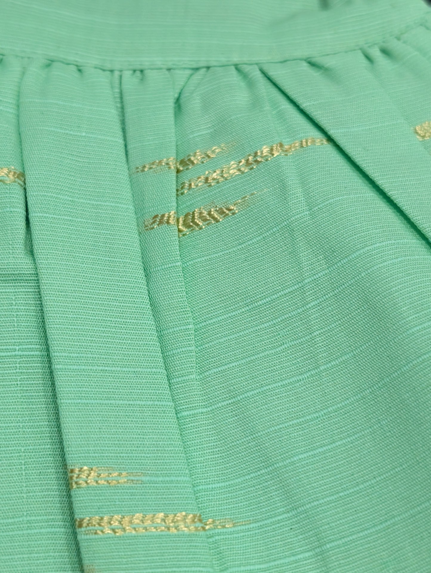 Self-printed and embroidered frocks and pants for baby girls.