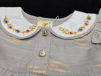 Self-printed and embroidered frocks and pants for baby girls.