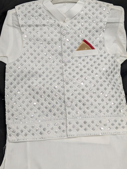 Boys' white kurta with matching pants and a silver embroidered waistcoat.