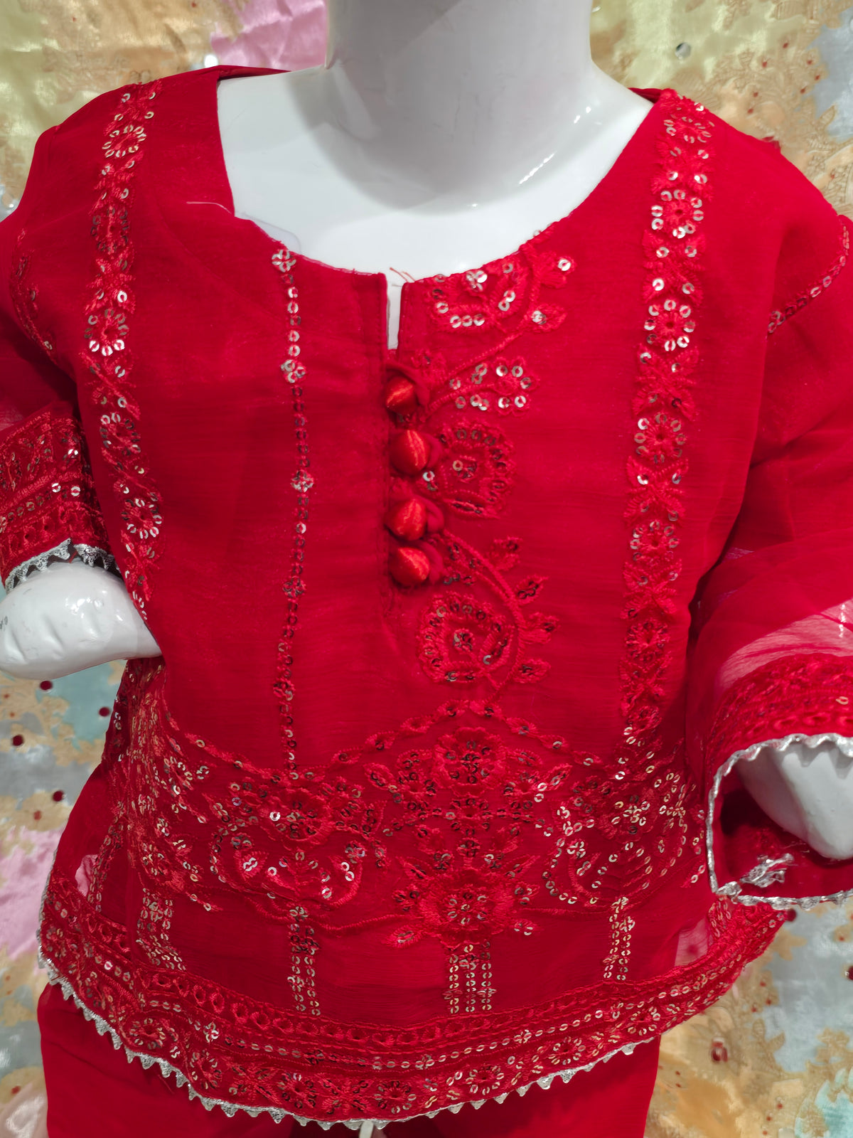 Girls Vibrant red  traditional kurta and pants set featuring intricate tonal embroidery, sequin work, and sheer sleeves.