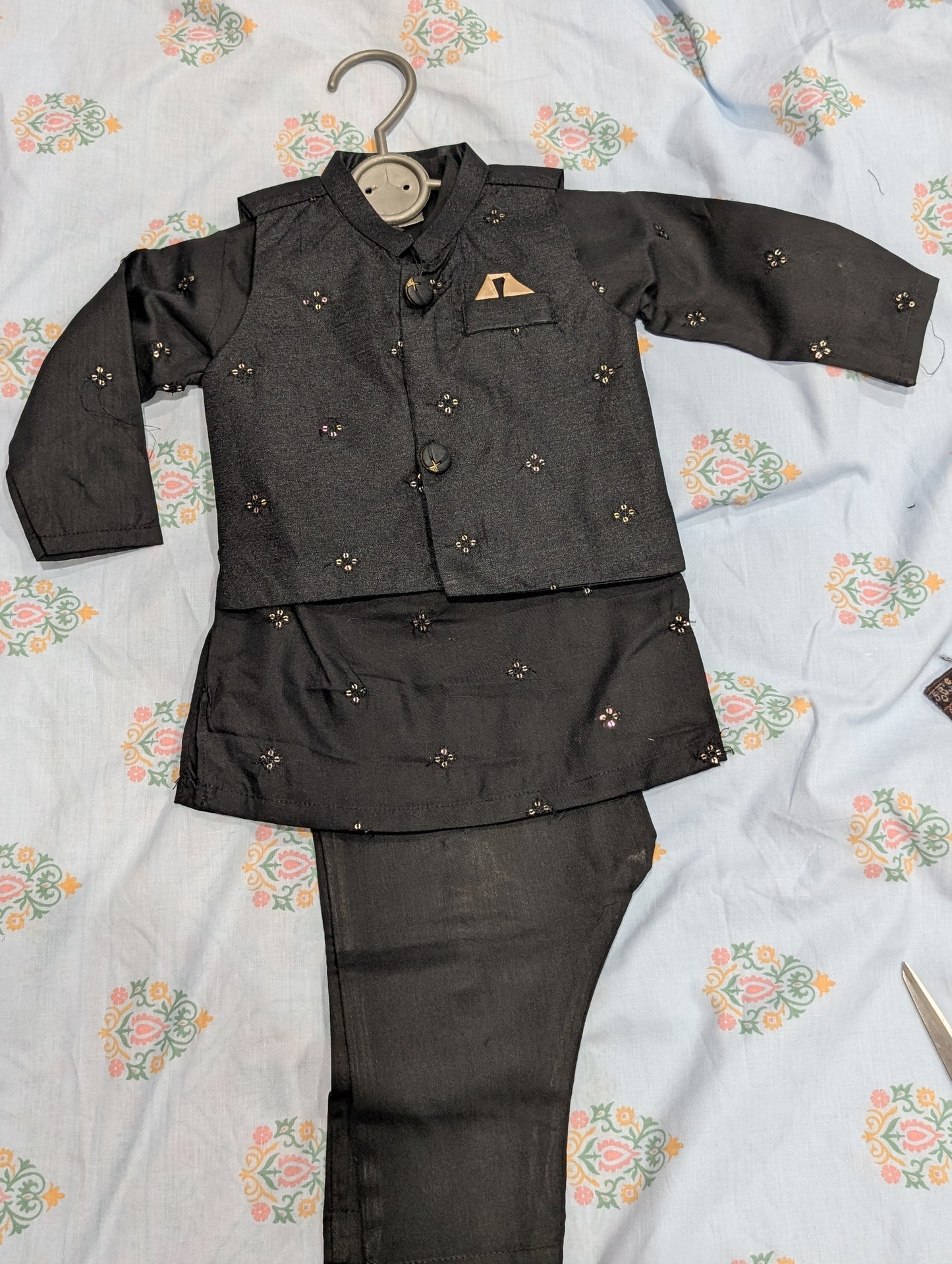 Infant black traditional  embroidered waistcoat, a matching  kurta, and coordinating pants,