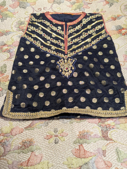 Infant sharara set featuring a navy blue polka-dot kurta paired with a pink and gold jacquard flared bottom and net duapatta