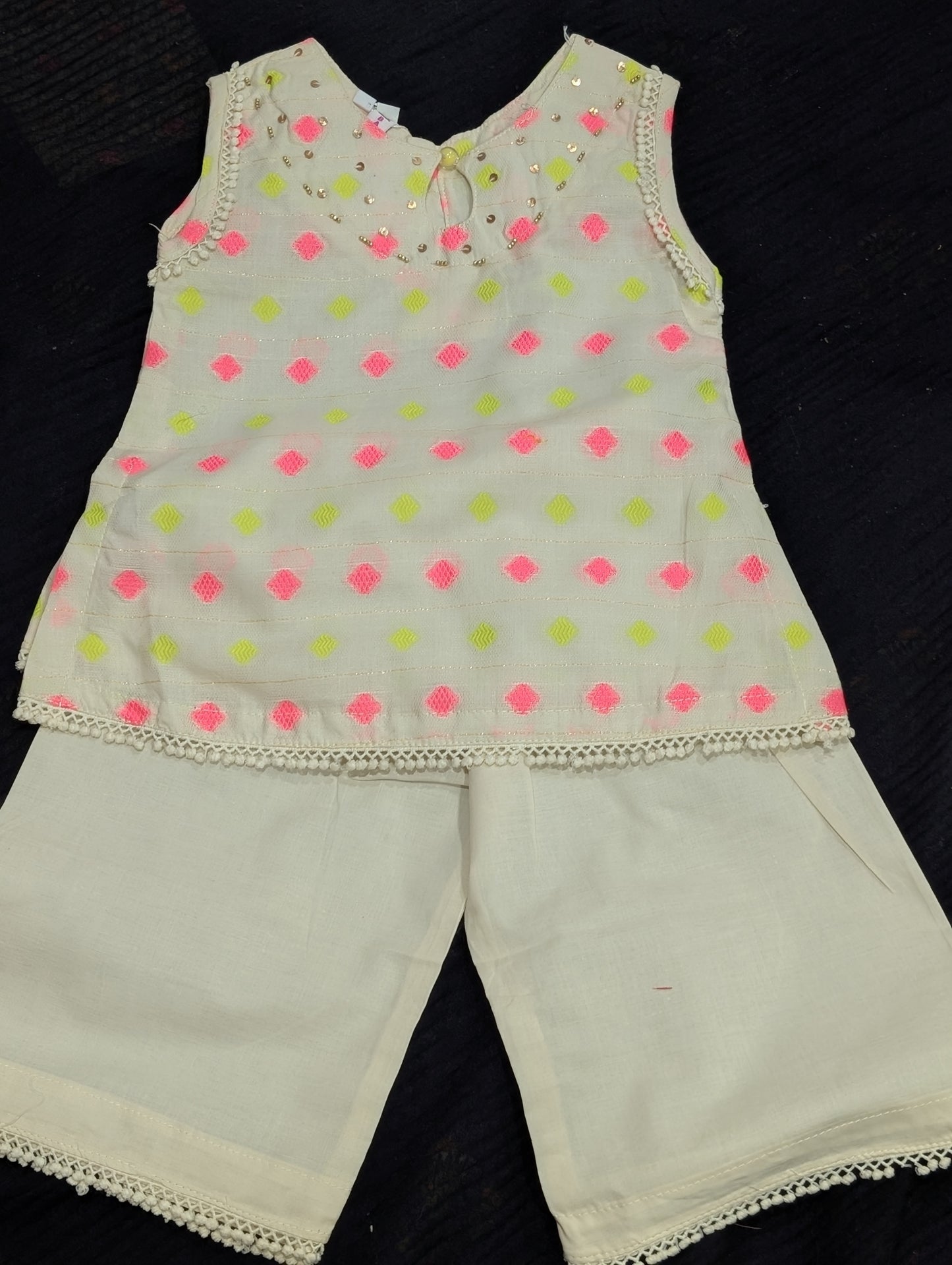 Infant lawn sleeveless tunic and matching wide-leg trousers with pink and lime green diamond patterns