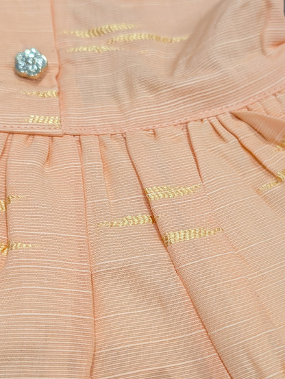 Self-printed and embroidered frocks and pants for baby girls.