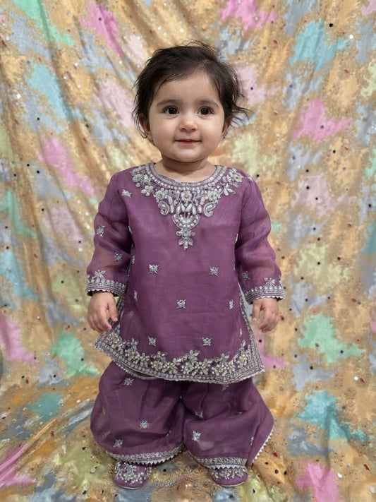Girls Mauve Embroidered 3-Piece Set: Organza kurta with a pearl-beaded yoke, matching embroidered gharara  and a lightweight dupatta.