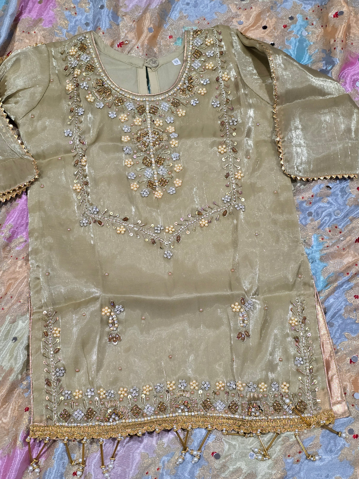 Girls /Olive-gold/  hand-embroidered /silk/ short kurta paired with matching flared gharara and sheer dupatta.